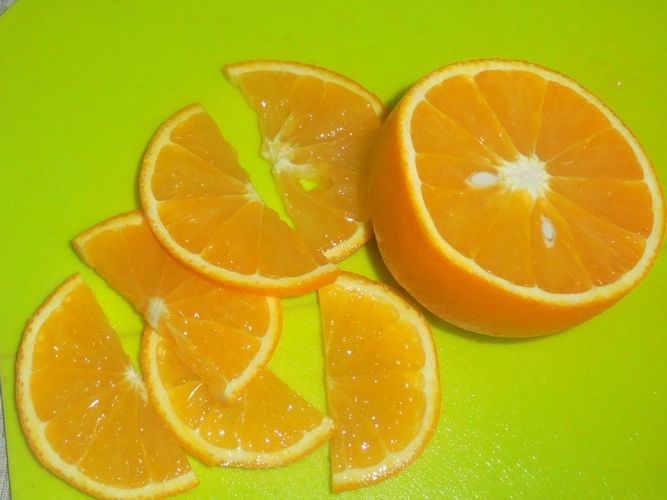 Горбуша, запечена з овочами під апельсинами