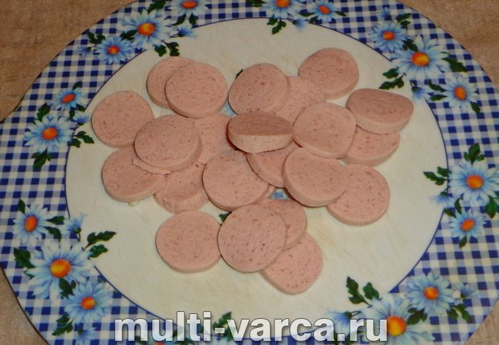 Гречка із сосисками в мультиварці