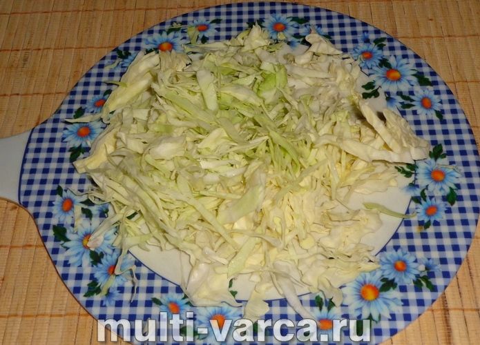 Кальмари з овочами в мультиварці