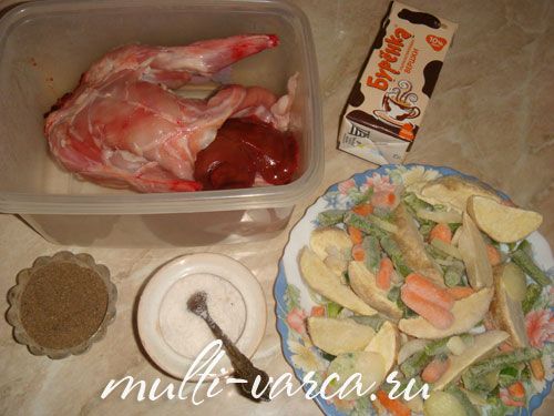 Тушкований кролик у вершках з овочами