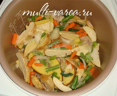 Тушкований кролик у вершках з овочами
